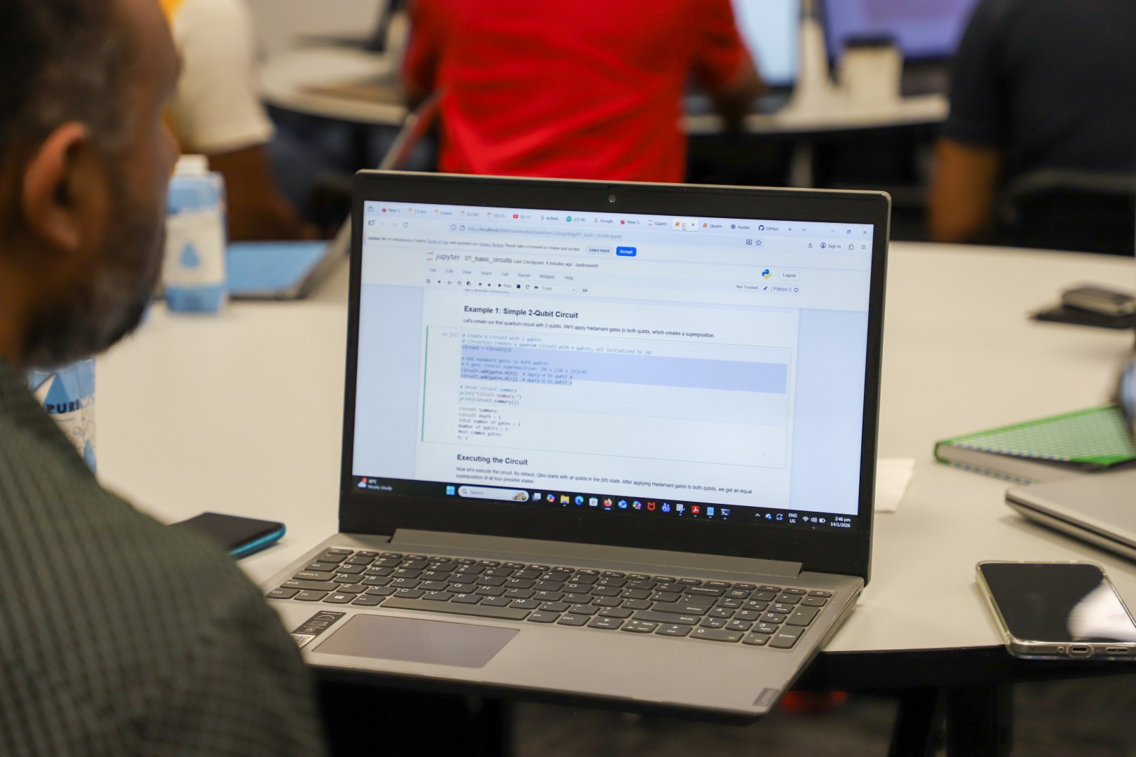 View of a laptop open to Example 1: Simple 2 Qubit-Circuit